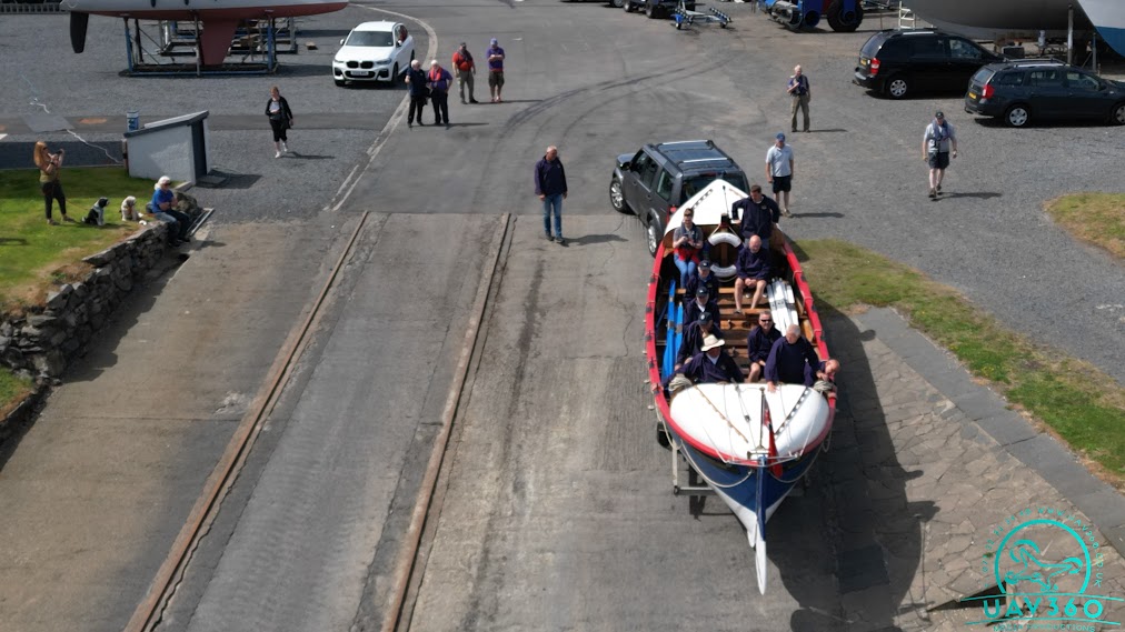 The Former Lifeboat Being Lowered Down The Slipway